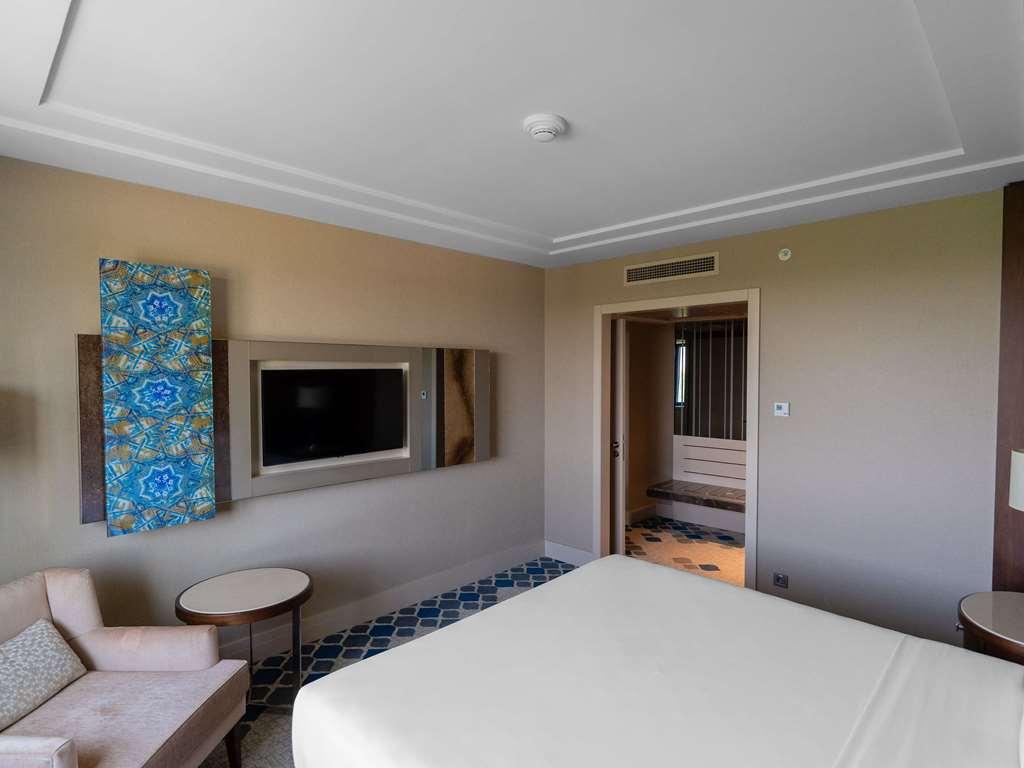 Moevenpick Hotel Tasjkent Kamer foto